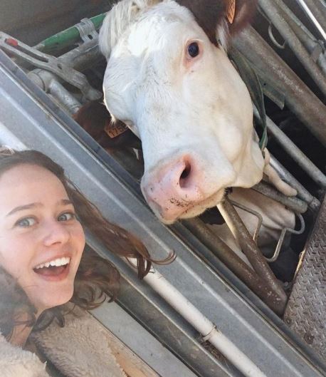 Lucie Fagedet enjoying selfi clicking with her cow   