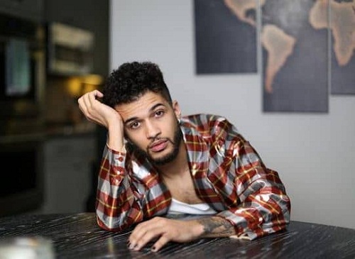 Jordan Fisher looking at the mobile