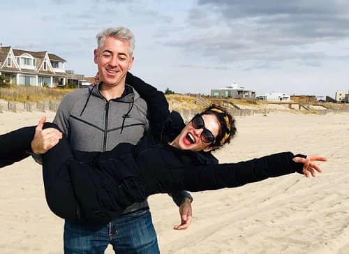 Bill Ackman holding his current partner, Neri Oxman, in his hands