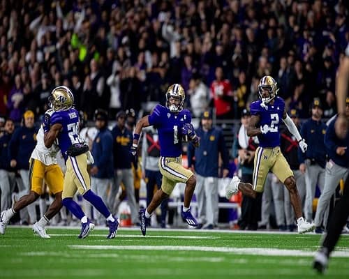 Rome Odunze playing for the Huskies