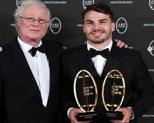 rugby union player Antoine Dupont with his awards