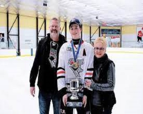 Alexis Lafreniere with his parents