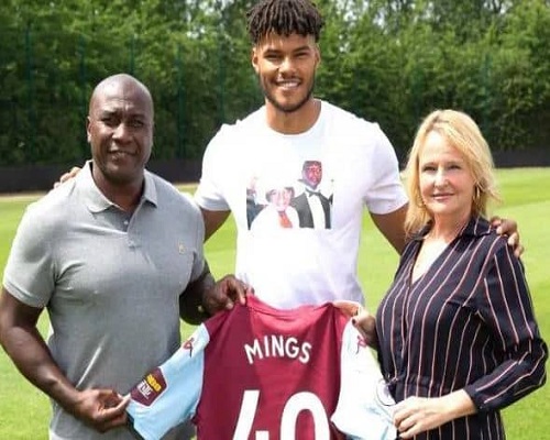 Tyrone Mings with his parents