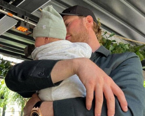 Elias Lindholm with his baby boy