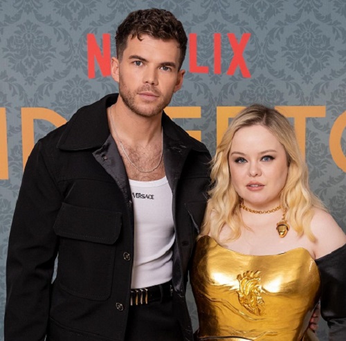 Luke Newton with actress