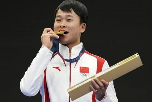 Xie Yu of China wins the 10-meter air pistol men's shooting gold medal